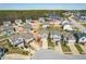 Aerial view of neighborhood featuring two story homes with attached garages and manicured lawns at 36 Labradoodle Ct, Garner, NC 27529