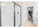 Clean bathroom with a stand-up shower and access to a walk-in closet at 36 Labradoodle Ct, Garner, NC 27529