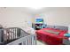 Comfortable bedroom features two beds, a TV, and a closet at 36 Labradoodle Ct, Garner, NC 27529