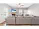 Inviting living room with a cozy fireplace, large sectional sofa, and abundant natural light at 36 Labradoodle Ct, Garner, NC 27529