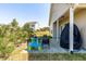 Back patio with outdoor seating and grill, perfect for relaxing and entertaining at 36 Labradoodle Ct, Garner, NC 27529