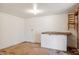 Unfinished basement with white walls, offering potential for customization and extra storage space at 401 Joyce Rd, Hillsborough, NC 27278