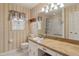 Full bathroom with vintage wallpaper, spacious countertop, and shower with curtain at 401 Joyce Rd, Hillsborough, NC 27278