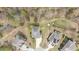 Aerial view of the neighborhood showcasing mature trees, lawns, and well maintained homes at 401 Molina Ct, Rolesville, NC 27571