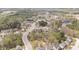 Aerial view of a beautiful neighborhood with mature trees and well-maintained homes at 401 Molina Ct, Rolesville, NC 27571
