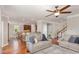 Bright living room showcasing an open layout leading to the kitchen and dining areas at 401 Molina Ct, Rolesville, NC 27571