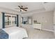 Spacious main bedroom suite with sitting area, fireplace, and natural light at 401 Molina Ct, Rolesville, NC 27571