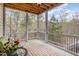 Relax on this screened porch with wood floors and wooded backyard views at 401 Molina Ct, Rolesville, NC 27571
