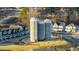 Community aerial view of three silos between homes with a fire pit and green space at 416 Holding Creek Dr, Wake Forest, NC 27587