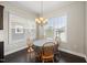 Dining room features hardwood floors and natural lighting at 416 Holding Creek Dr, Wake Forest, NC 27587
