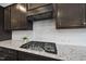 Gourmet kitchen featuring granite countertops, stainless steel appliances, and a modern gas range at 416 Holding Creek Dr, Wake Forest, NC 27587