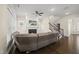 Cozy living room with a fireplace, built-in shelves, and an open staircase at 416 Holding Creek Dr, Wake Forest, NC 27587