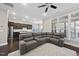 Spacious living room featuring an open layout, modern decor, and a view into the kitchen at 416 Holding Creek Dr, Wake Forest, NC 27587