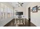 Office space with a sit stand desk and a large window with natural lighting at 416 Holding Creek Dr, Wake Forest, NC 27587