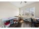 Bright office space with natural light, hardwood floors, and ample storage solutions at 416 Holding Creek Dr, Wake Forest, NC 27587