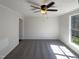 Bright bedroom with fresh paint and a large window providing natural light at 5605 Christie Ln, Durham, NC 27713