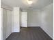View of the carpeted bedroom, closet, and a view to a next room at 5605 Christie Ln, Durham, NC 27713