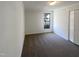 Bedroom shows a carpet, neutral paint, closet, window, and white trim at 5605 Christie Ln, Durham, NC 27713