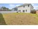 Expansive backyard featuring a privacy fence, patio, and ample space for outdoor activities and entertaining at 609 Embrun Run, Wendell, NC 27591