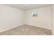 Bright bedroom with neutral walls and large window, perfect for relaxation at 609 Embrun Run, Wendell, NC 27591