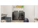 Convenient laundry room equipped with modern washer and dryer at 609 Embrun Run, Wendell, NC 27591