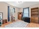 Well-lit bedroom with hardwood floors and furniture at 6208 Silver Spring Ct, Willow Springs, NC 27592