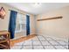 Neutral bedroom with hardwood floors and lots of natural light at 6208 Silver Spring Ct, Willow Springs, NC 27592