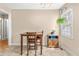 Bright breakfast nook with table, chairs, and natural light at 6208 Silver Spring Ct, Willow Springs, NC 27592