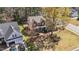 Gorgeous house with professional landscaping, lush lawn, and mature trees on a sunny day at 749 Hadrian Dr, Garner, NC 27529