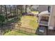 Spacious fenced backyard featuring a covered porch, providing a private outdoor retreat at 749 Hadrian Dr, Garner, NC 27529