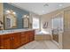 Bathroom features a soaking tub, separate shower, and double vanity at 749 Hadrian Dr, Garner, NC 27529