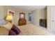 Bedroom with warm colors featuring a dresser and a comfortable looking bed at 749 Hadrian Dr, Garner, NC 27529