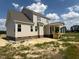 Rear view of a home under construction with a partially completed covered patio at 85 Prency Ln, Middlesex, NC 27557