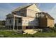 New home under construction, with framing for a covered patio and wood materials at 85 Prency Ln, Middlesex, NC 27557