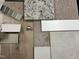 Home design selections featuring wood flooring, carpet, granite countertops, and neutral paint swatches at 85 Prency Ln, Middlesex, NC 27557