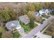 Aerial view of a suburban neighborhood showing manicured lawns, tree-lined streets, and well-kept homes at 904 Hidden Jewel Ln, Wake Forest, NC 27587