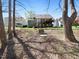 Backyard featuring a staircase leading up to the deck and beautiful landscaping at 904 Hidden Jewel Ln, Wake Forest, NC 27587