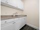 Convenient laundry room with built in sink at 904 Hidden Jewel Ln, Wake Forest, NC 27587