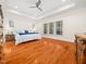 Spacious main bedroom with tray ceiling, hardwood floors and bright natural light at 904 Hidden Jewel Ln, Wake Forest, NC 27587