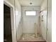 Modern bathroom displays new subway tile in the shower and updated window at 95 Cherry Bark Dr, Youngsville, NC 27596