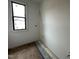 Bathroom features new flooring and updated window with black trim at 95 Cherry Bark Dr, Youngsville, NC 27596