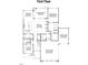 First floor plan featuring a primary bedroom, Gathering room, kitchen, dining room, guest suite, and garages at 95 Cherry Bark Dr, Youngsville, NC 27596