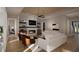 Cozy living room with modern fireplace, built-in shelves, and ample seating space at 95 Cherry Bark Dr, Youngsville, NC 27596