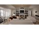 Stylish living room featuring a fireplace, built-in shelving, and comfortable seating at 95 Cherry Bark Dr, Youngsville, NC 27596