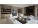 Stylish living room with a cozy seating area, custom built-ins, and modern decor at 95 Cherry Bark Dr, Youngsville, NC 27596