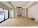 Spacious living room featuring a modern fireplace and built-in shelving for stylish storage at 95 Cherry Bark Dr, Youngsville, NC 27596