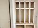 Unfinished mudroom showcasing a built-in storage area with shelving at 95 Cherry Bark Dr, Youngsville, NC 27596
