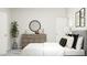 Bright bedroom featuring a neutral color palette, comfortable bed, and decorative accents for a modern feel at 300 Calvander Ln, Apex, NC 27539