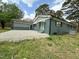 Picture of the spacious backyard with lush lawn, great for outdoor entertaining and activities at 1 Greenfield Ct, Durham, NC 27705