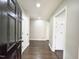 Inviting entryway with hardwood floors and neutral paint color at 1 Greenfield Ct, Durham, NC 27705